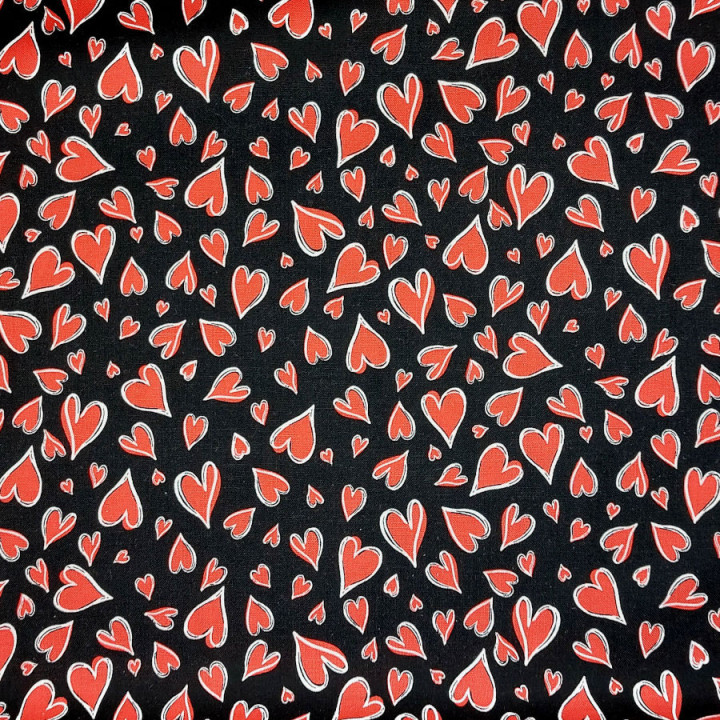 Tissu cœurs rouges sur fond noir - coton