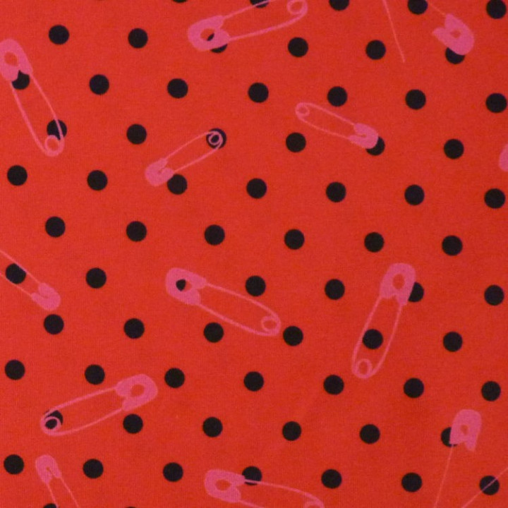 Tissu jersey rouge à pois noirs et épingles roses