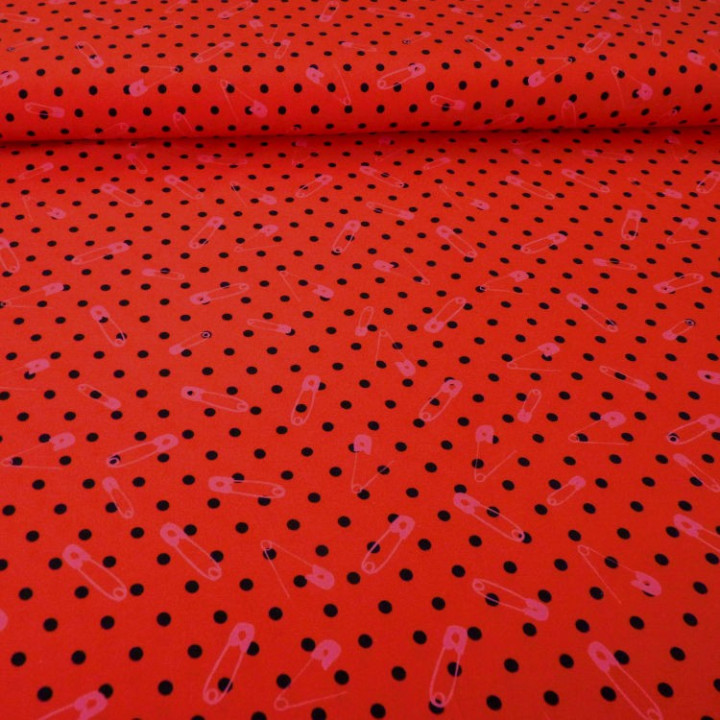 Tissu jersey rouge à pois noirs et épingles roses
