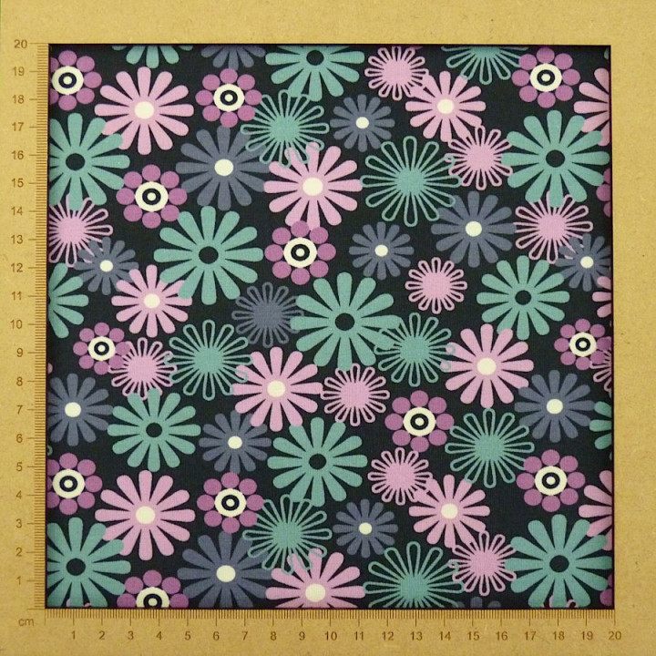 Tissu jersey bleu foncé fleurs bleues roses et mauves